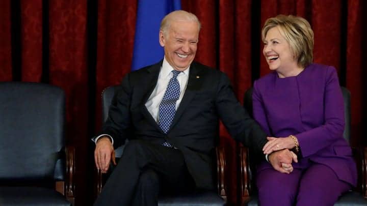 Biden and Clinton laughing together