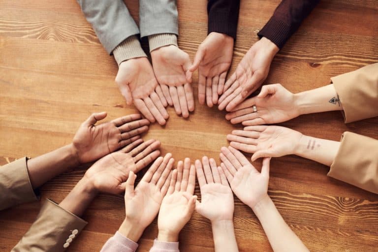 hands in a circle, global solidarity