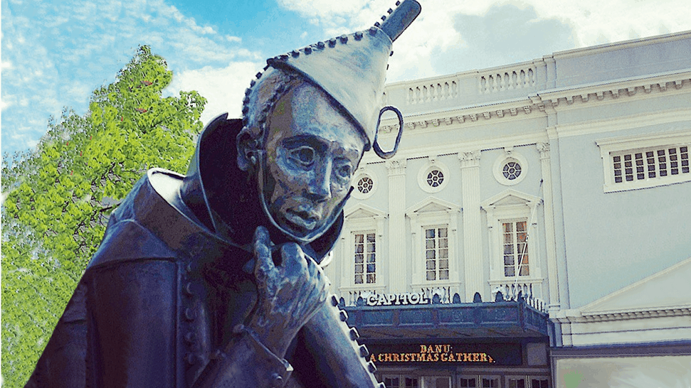 Statue of the Tin Man in a Thinker pose